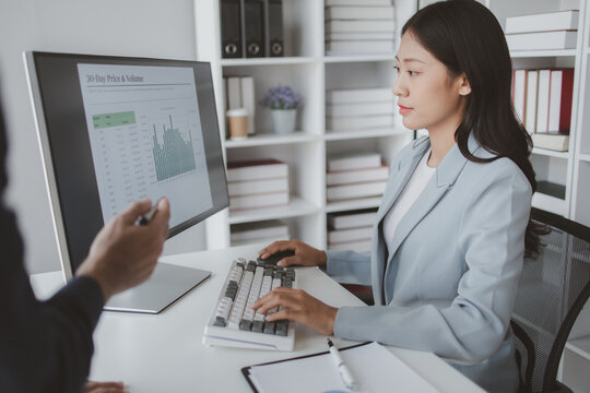 Person is looking at the meeting summaries, the executive secretary is reviewing the information and summarizing the information to submit a report to the executive for review. Data analysis concept.