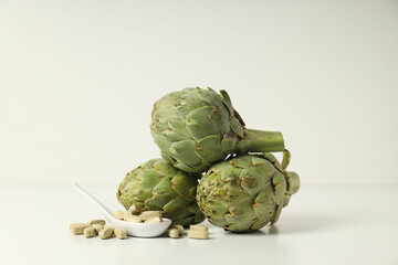 Obraz premium Products for healthcare, healthcare concept - artichoke medicine