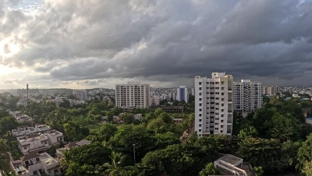 Beautiful Evening timelapse of Pune city with clear blue skies at sunset with urban cityscape