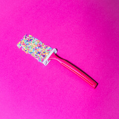The razor leaves a trace in the form of a colored sprinkle. Total pink, minimal creative concept - 640221157