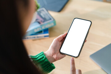 Human working on modern smartphone with blank white mobile screen for advertising, mockup, technology, advertising, search information, creative design, social media, online marketing, chat, phone