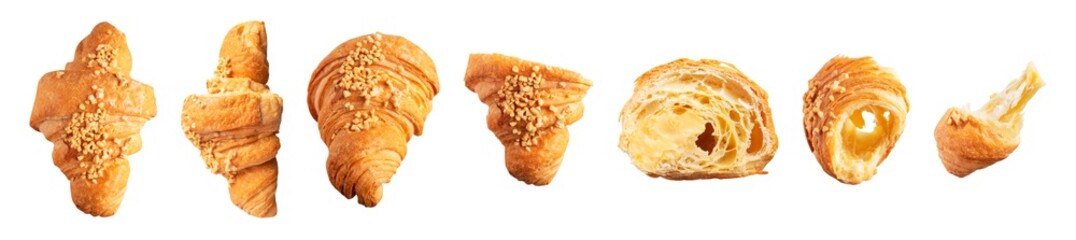 Cut out fresh classic french croissant sprinkled with nuts isolated on white background. Whole and broken croissant. With clipping path. Sweet pastry, bun, dessert. Food objects for design