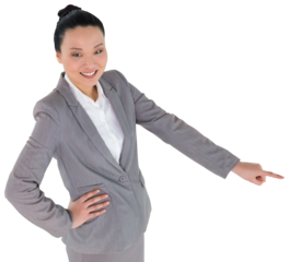 Digital png photo of smiling biracial businesswoman pointing on transparent background