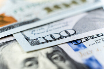 A lot of 100 dollar bills close-up macro.