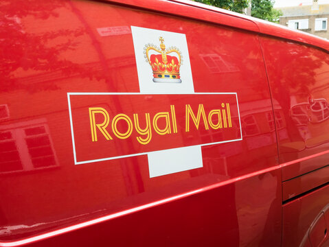 London, UK, August 26th 2023:A red Royal Mail deliver van, logo sign. Concept for post office, scandal, transport and strikes.