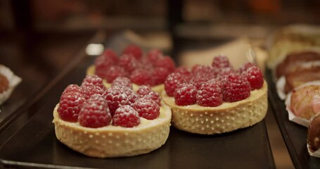Sweet desserts at the restaurant. Fresh pastries and cakes in buffet. Assortment of desserts on display, cakes on display. There are various desserts in fridge.