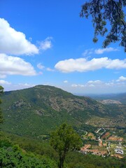 Fototapeta na wymiar landscape, sky, mountain, nature, mountains, clouds, grass, green, hill, view, summer, cloud, forest, tree, panoramic, meadow, panorama, countryside, hills, spring, field, village, trees, valley, blue