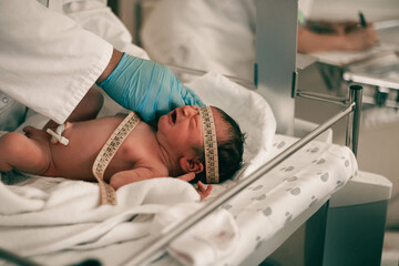 In a bustling hospital room, a caring nurse with a measuring tape in hand, takes accurate...