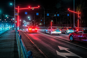 Modern traffic light in night city. Red stop light