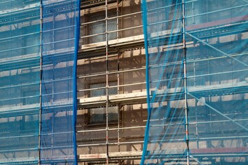 Scaffolding and netting in a construction site