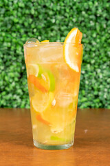 cocktail in a glass with fruits and gin
