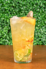 cocktail in a glass with fruits and gin