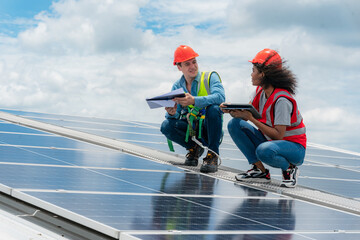 Professional specialist technician engineer working to maintenance checking and installing solar...