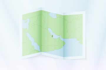 Qatar map, folded paper with Qatar map.