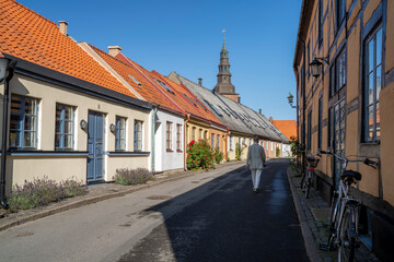 Romantic Old Town Cobble Street with Housing at Ystad Midtown overlooking Church and City Center, Skane Sweden.