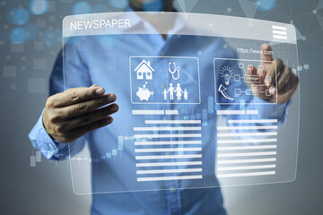 Businessman reading news through digital newspaper on virtual screen to get economic and finance...