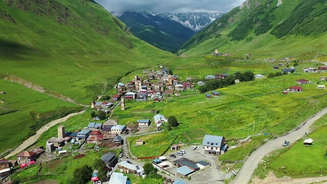 Ushguli village with buildings aerial view from drone. Located at head of Enguri gorge in Svaneti, Georgia. Ushguli is one of highest continuously inhabited settlements in Europe with famous Svan
