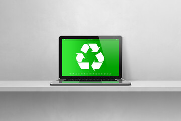 Laptop computer on a shelf with a recycling symbol on screen. environmental conservation concept