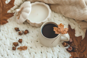 Cup of hot tea and a leaf, autumn mood