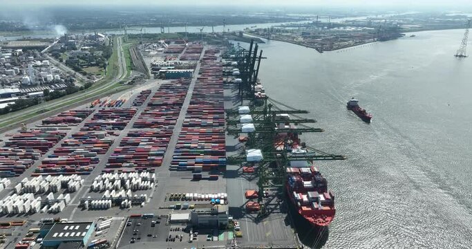 Antwerp, 12th of August, 2023, Belgium. Aerial drone view on the Noordzee terminal, in the port of Antwerp, able to handle the largest sea ships.