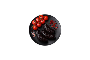 Delicious black blood sausage or black pudding with spices and herbs