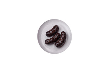 Obraz premium Delicious black blood sausage or black pudding with spices and herbs