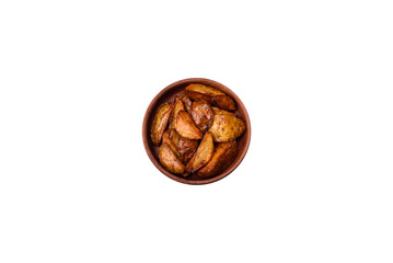 Delicious grilled potato slices with garlic, spices and herbs