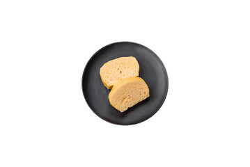Delicious omelet with milk, spices and herbs cut into large pieces