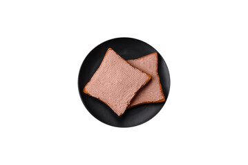 Delicious crispy toast with chicken or goose pate with salt and spices