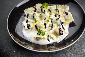 ravioli seafood cream sauce pasta meal food snack on the table copy space food background rustic top view