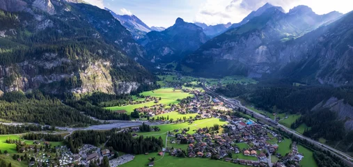 Gordijnen Swiss nature scenery. Kandersteg village with stunning valley surrouded by high Alps mountains. popular tourist ski resort. Canton Bern, Switzerland. aerial view © Freesurf