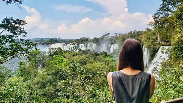 girl looking at the waterfalls
