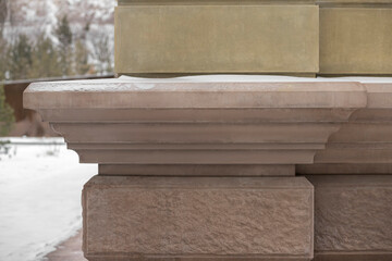 A building finished with concrete embellishments