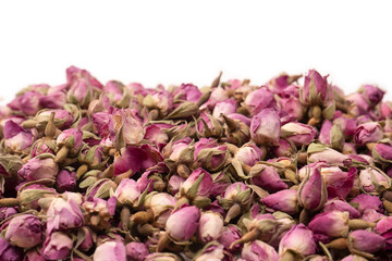 Dry tea roses isolated on white background.
