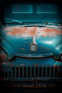Old vintage rusty car front view closeup details