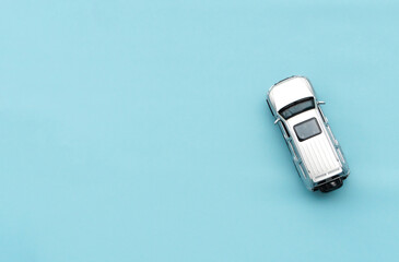 Car model isolated on blue background, after some edits.