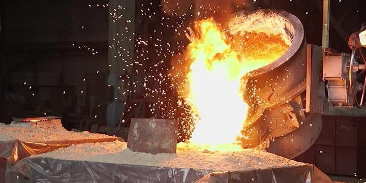 Liquid iron molten metal pouring in container, industrial metallurgical factory, foundry cast, heavy industry background