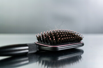 hair falling out, hair on the hairbrush