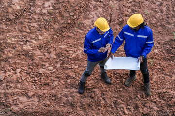 top aerial view engineer worker builders looking drawing for construction. Concept smart people...