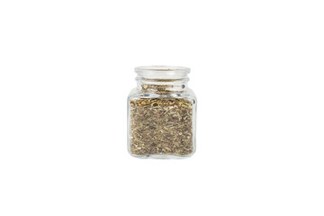 Dry Tansy Herb in latin Tanacetum vulgare in a glass jar isolated on white background. Herbs. Alternative medicine.