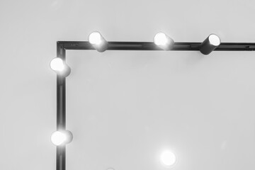 Interesting white lath ceiling with modular light fixtures
