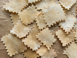Noodles, dough, flour product on a baking sheet