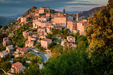 Fototapeta na wymiar Ancient mountain village of Speloncato in evening lights in the Balagne region of Corsica island, France