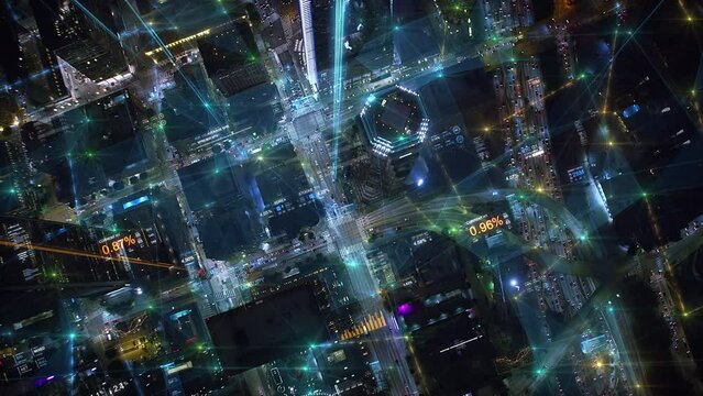 Hyper Connected Financial District With Animated Augmented Reality Elements. Over Head At Night. Great Aerial View of Futuristic City With Holographic Graphs and Charts.