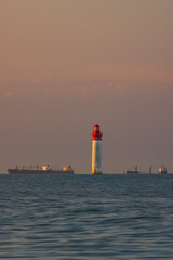 Phare de Chauvea near Ile de Re with ships to La Rochelle, Pays de la Loire, France