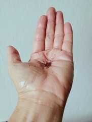strawberry seeds in hand