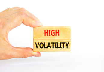 High volatility symbol. Concept words High volatility on beautiful wooden blocks. Beautiful white...
