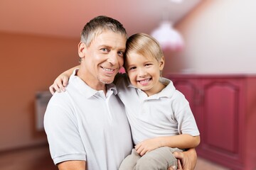 Fototapeta premium Happy young father and child at home together