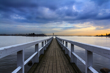 Pier over the sea at sunset