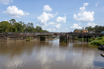 Old bridge over pond or lake.